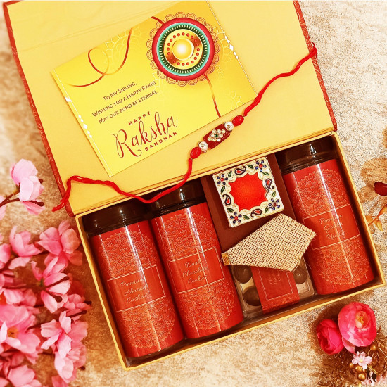 NutriSnacksBox Rakhi Gift Hamper for Brother with 1 Rakhi & Kumkum Vatti | Dark Chocolate Cookies, Dark Choco Dragees, Dark Chocolates, Golden Raisins & Almond Cashew Dry Fruits